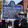 Webb poses ''Thumbs Up!'' alongside Trumpet's Blues Trail Marker. Photo Credit: Gary Bohannon